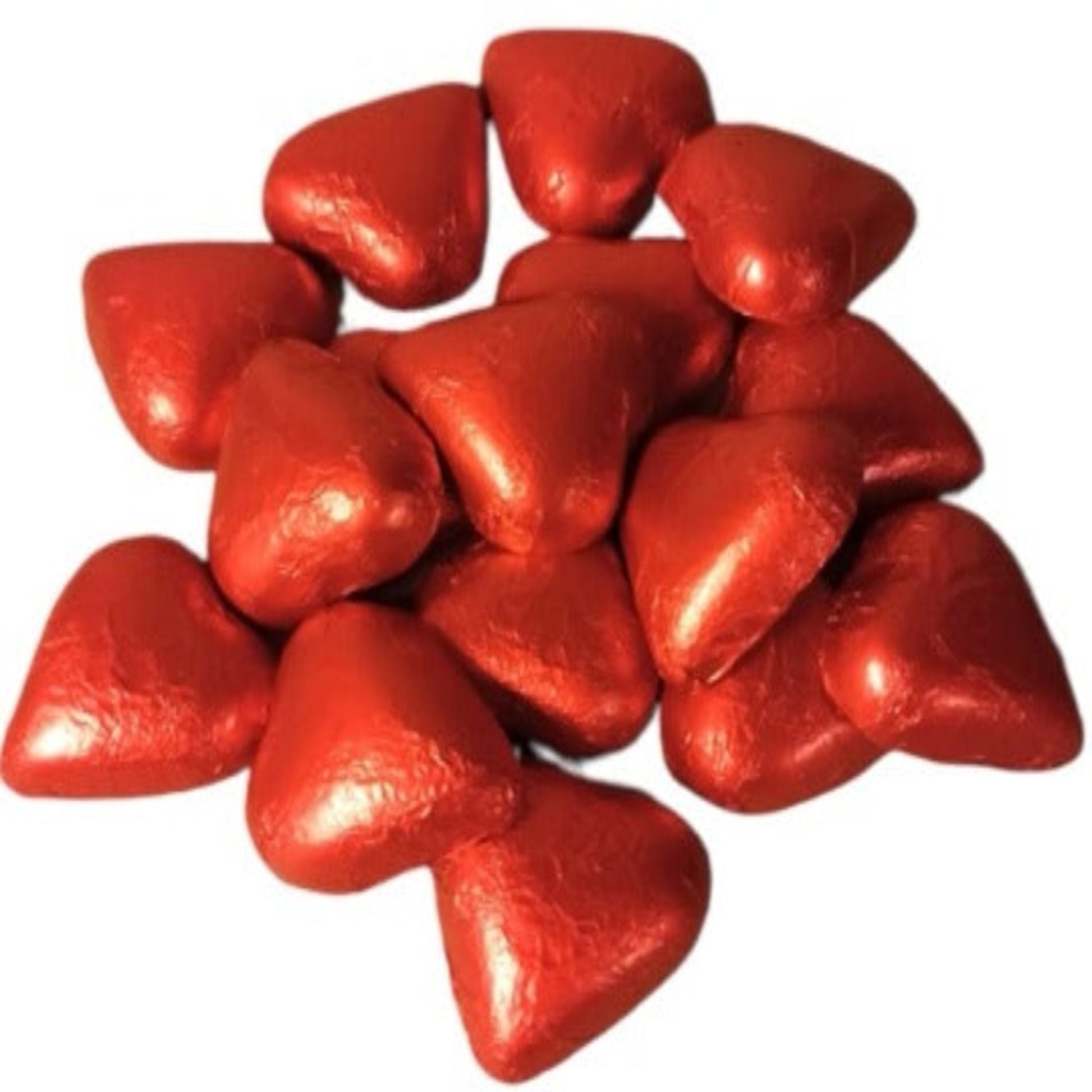 Sydämenmuotoisia suklaapaloja punaiseen folioon käärittynä.