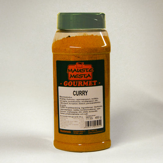 Kullanruskeaa currya isossa läpinäkyvässä muovipurkissa vihreällä sirotinkannella.